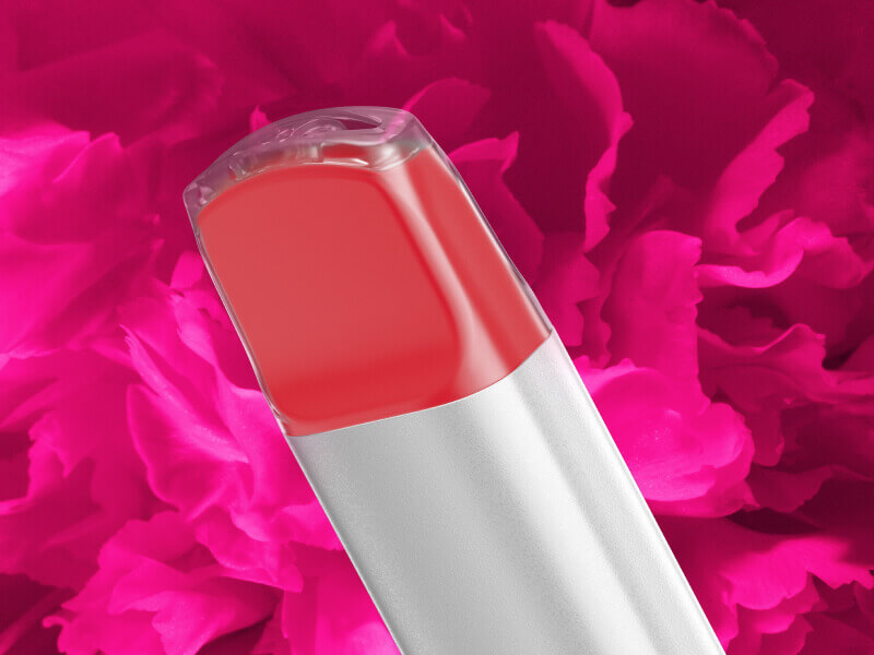 Primer plano de la boquilla de vapeo VEEV NOW sobre un fondo rosa